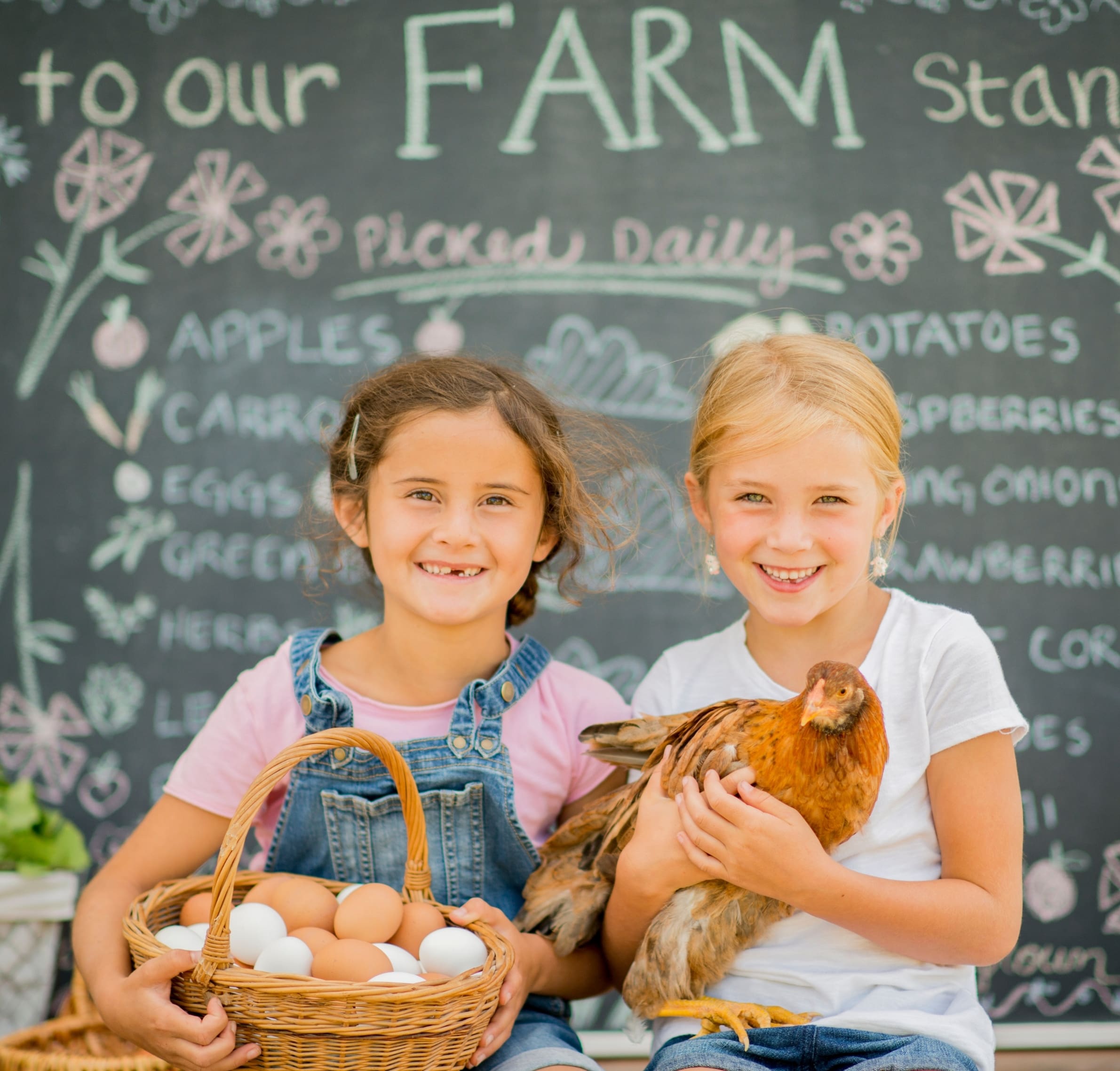 kids selling their farm fresh produce at market